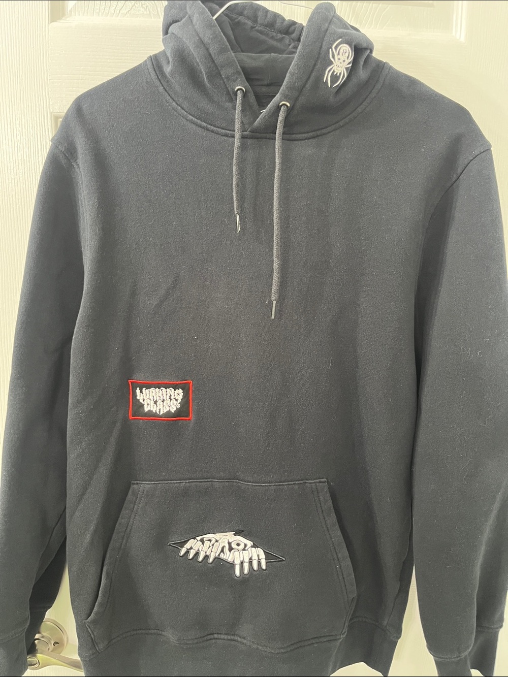Lurking Class Black Graphic Pullover Hoodie with Embroidered Patches